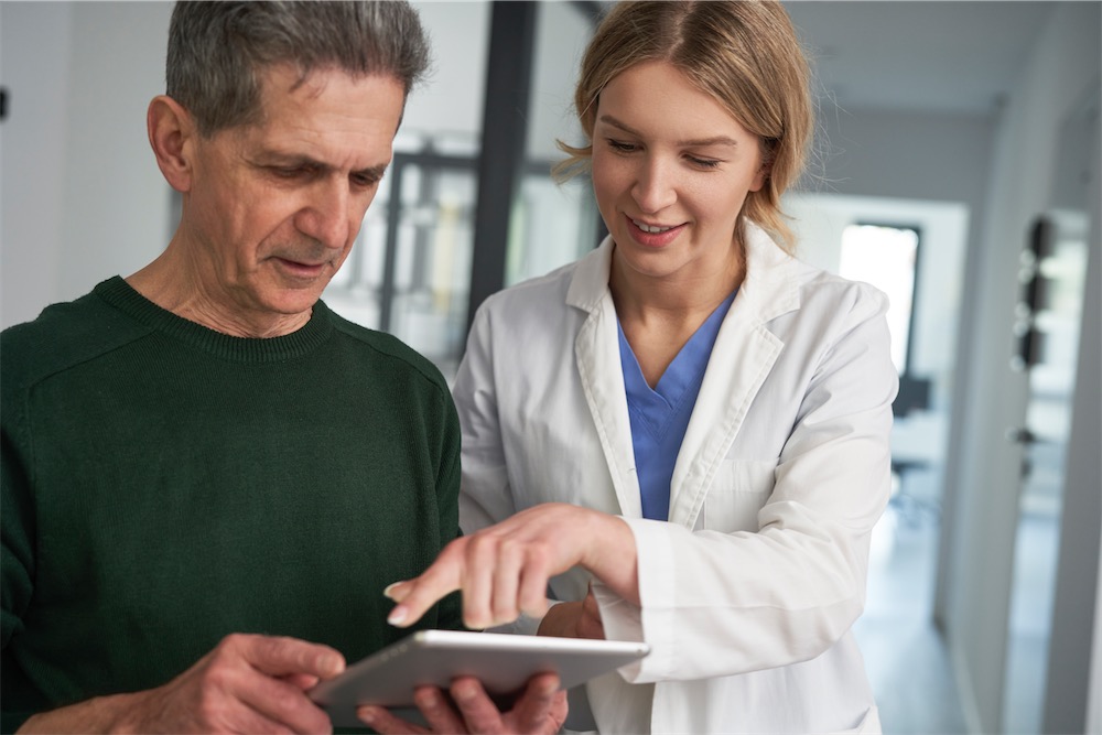 Doctor consulting with patient